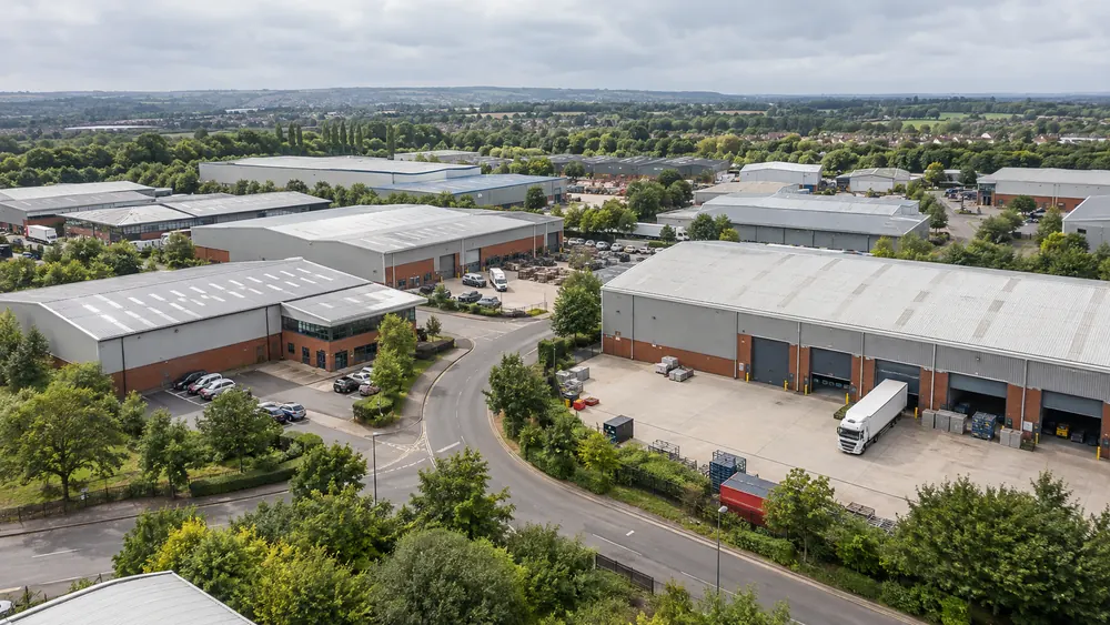 Warehouse roofs and vehicle access yards illustrating the Nottingham commercial coverage area